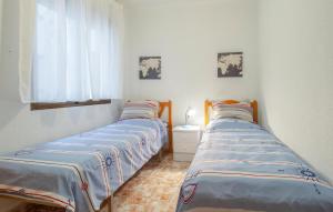 Posteľ alebo postele v izbe v ubytovaní Cozy Apartment In Torrevieja With Wifi