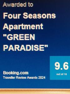 um sinal que diz quatro estações nomeação paraíso verde em Four Seasons Apartment "GREEN PARADISE" em Villach