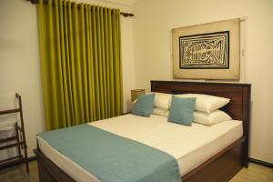 Ένα ή περισσότερα κρεβάτια σε δωμάτιο στο Villa Black Bamboo