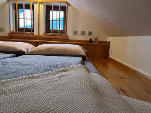 Кровать или кровати в номере Ubytování Monika