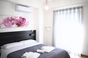 Postel nebo postele na pokoji v ubytování B&B Da Bea