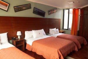 Krevet ili kreveti u jedinici u objektu HOTEL MADURAI