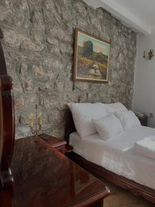 Letto o letti in una camera di Garni hotel Oblačinsko jezero