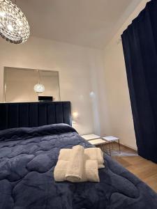 Postel nebo postele na pokoji v ubytování Domus Iulius + 13 fotografií