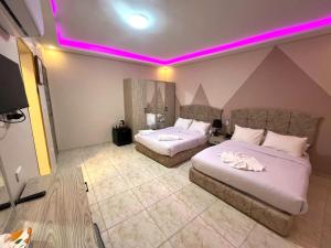 Letto o letti in una camera di Pyramids Nun INN