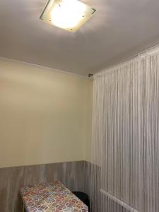 Katil atau katil-katil dalam bilik di Cat Garden Family Apartments Riga
