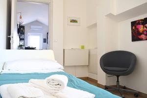 a hospital room with a bed and a chair at B&B Da Bea in Chieti