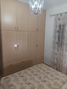 Postel nebo postele na pokoji v ubytování Lina's House Sivota