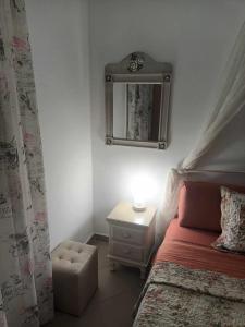 Postel nebo postele na pokoji v ubytování Lina's House Sivota