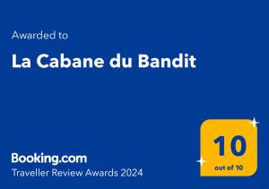 Certifikat, nagrada, logo ili neki drugi dokument izložen u objektu La Cabane du Bandit