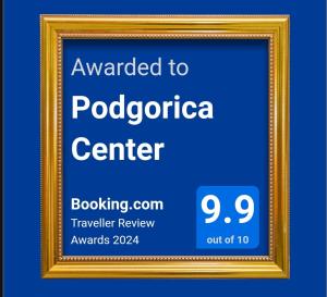 a gold picture frame with the text awarded to podocoptera center at Podgorica Center in Podgorica