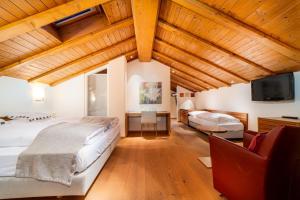 Voodi või voodid majutusasutuse Hotel Allalin Saas-Fee toas