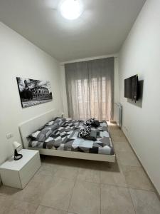 Ένα ή περισσότερα κρεβάτια σε δωμάτιο στο Monti Deluxe Apartment