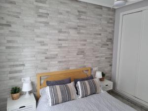 Łóżko lub łóżka w pokoju w obiekcie Apartment Amelia