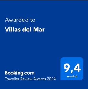 a blue screen with the text awarded to villas del mar at Villas del Mar in La Ceiba