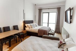 Postel nebo postele na pokoji v ubytování Your Cozy Montain Hideaway