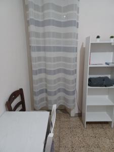 Posteľ alebo postele v izbe v ubytovaní B&B Appartamenti NAPOLI