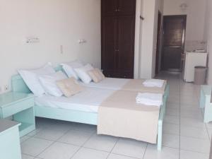 Postel nebo postele na pokoji v ubytování Diomare Villas