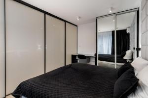 Posteľ alebo postele v izbe v ubytovaní Diamonds Apartment