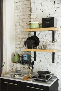 A kitchen or kitchenette at Magnova Studios