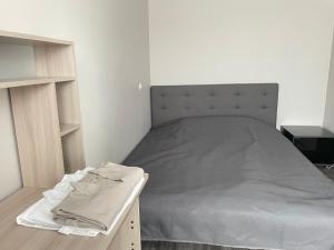 Postel nebo postele na pokoji v ubytování Vironia Apart
