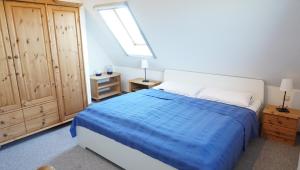 Ένα ή περισσότερα κρεβάτια σε δωμάτιο στο Ankerplatz