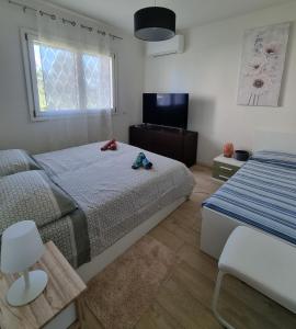 Voodi või voodid majutusasutuse New Living Milano toas