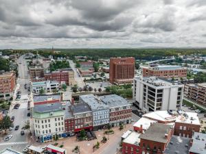 an aerial view of a city with buildings at The Phenix Historic DTWN Hotel, King Bed Room #300 in Bangor