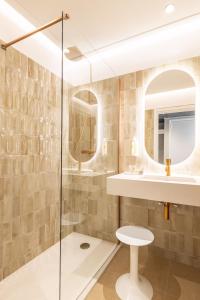 Ванна кімната в Hotel des Lices