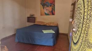 Katil atau katil-katil dalam bilik di hostal y Restaurante Entre Olas