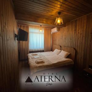 Postel nebo postele na pokoji v ubytování ATERNA HOTEL