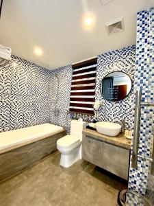 a bathroom with an american flag painted on the wall at Tam Coc Condelux Boutique Hotel & Travel in Ninh Binh