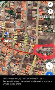 a map of a street with a red at Quarto Sertão no Mar in Barra do Cunhau