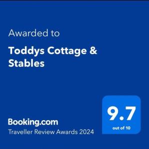 Un certificat, premiu, logo sau alt document afișat la Toddys Hideaway