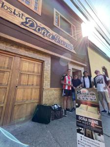 a group of people standing outside of a building at Hostal doña irene in Vicuña