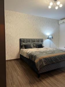 Postel nebo postele na pokoji v ubytování Apartman Felix