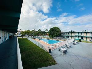 an overhead view of a swimming pool in a building at Boca Inn in Boca Raton