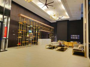 Uma área de estar em Cubic Botanical Studio 情侣体验民宿电影院的感觉