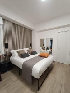 Postel nebo postele na pokoji v ubytování B&B Regina 381