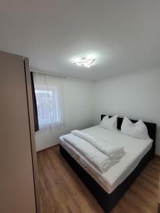 Postel nebo postele na pokoji v ubytování Apartment an der Donau