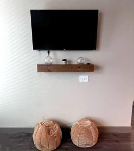TV i/ili multimedijalni sistem u objektu Comfortable Apartment in Dallas