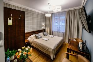 Posteľ alebo postele v izbe v ubytovaní Villa Neve