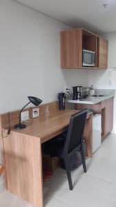 Kuchyň nebo kuchyňský kout v ubytování STUDIO ALTO PADRÃO ITAIPAVA