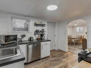 a kitchen with a sink and a counter top at Centrally Located in the Heart of Provo 2 BR in Provo
