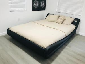 a large bed in a room with at 10515 Houston Avenue in Hudson