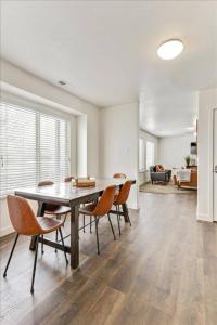 a dining room with a table and chairs at King Bed Lots of Parking Open Living Room in Springville