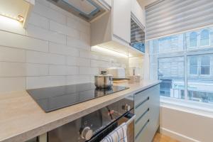 Η κουζίνα ή μικρή κουζίνα στο Cosy 2 Bedroom Flat in Lake District