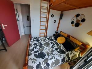 מיטה או מיטות בחדר ב-Maison Seignosse, 2 pièces, 4 personnes - FR-1-239-421