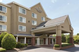 a rendering of the front of a hotel at Country Inn & Suites by Radisson, Buford at Mall of Georgia, GA in Buford