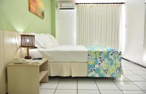 Voodi või voodid majutusasutuse Hotel - Gran Lençóis flat 410 toas